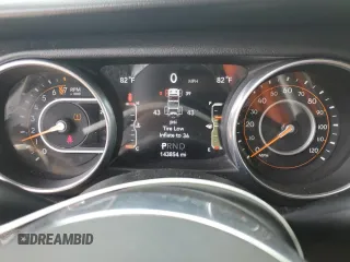 2018 Jeep Wrangler Unlimited Sahara with VIN 1C4HJXEG0JW141101, listed as a Copart auction lot 56573195 with 143,854 mi miles and Salvage title. Bid and sale history available at DreamBid. Image 9.