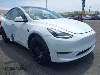2022 Tesla Model Y Performance with VIN 7SAYGDEF8NF407109, listed as a IAAI auction lot 42014282 with 24,937 mi miles and . Bid and sale history available at DreamBid. Image 1.