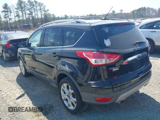 2016 Ford Escape Titanium with VIN 1FMCU0JX8GUC06601, listed as a IAAI auction lot 41785774 with 121,427 mi miles. Bid and sale history available at carsss.com. Image 14.