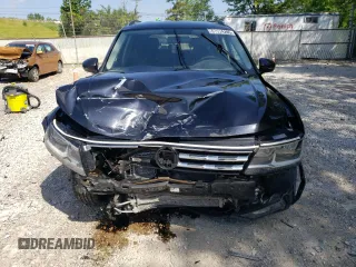 2018 Volkswagen Tiguan S with VIN 3VV0B7AX5JM033302, listed as a Copart auction lot 61534745 with 111,230 mi miles and Salvage title. Bid and sale history available at DreamBid. Image 5.