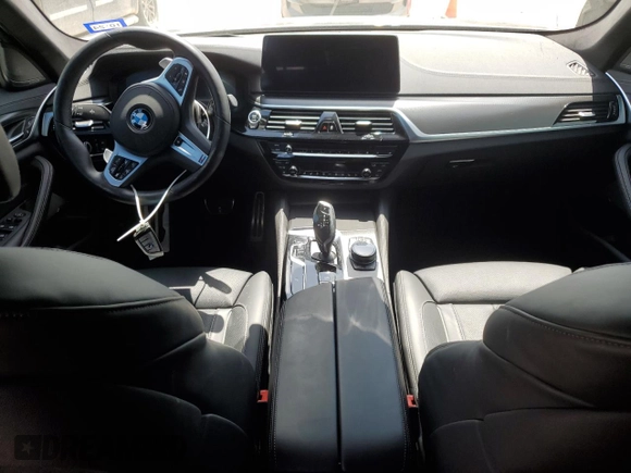 2022 BMW 5 Series M550i xDrive z VIN WBA13BK09NCJ00508, wystawiony jako Copart lot #58077634 z przebiegiem Nie podano mil oraz . Historia ofert i sprzedaży dostępna na DreamBid. Obrazek 8.