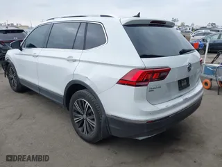 2018 Volkswagen Tiguan SEL with VIN 3VV3B7AX9JM090342, listed as a IAAI auction lot 41895823 with 98,400 mi miles. Bid and sale history available at carsss.com. Image 3.
