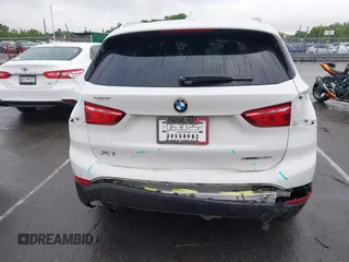2019 BMW X1 xDrive28i with VIN WBXHT3C54K3H35641, listed as a IAAI auction lot 42241894 with 100,989 mi miles and . Bid and sale history available at DreamBid. Image 6.