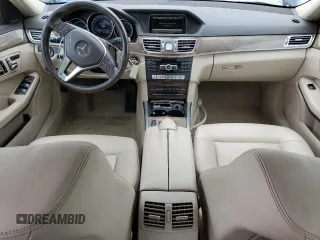 2014 Mercedes-Benz E 350 Luxury with VIN WDDHH8JB6EA809262, listed as a Copart auction lot 51817555 with 122,948 mi miles and Salvage Title. Bid and sale history available at DreamBid. Image 8.