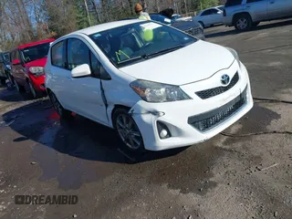 2014 Toyota Yaris L with VIN JTDKTUD31ED590687, listed as a IAAI auction lot 41190914 with 95,330 mi miles and . Bid and sale history available at DreamBid. Image 1.