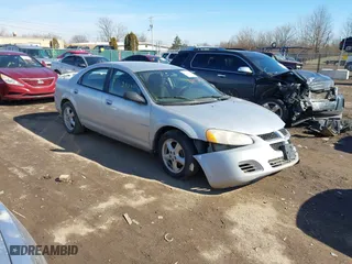 2004 Dodge Stratus SXT with VIN 1B3EL46X64N128617, listed as a IAAI auction lot 41584871 with 140,316 mi miles. Bid and sale history available at carsss.com. Image 1.