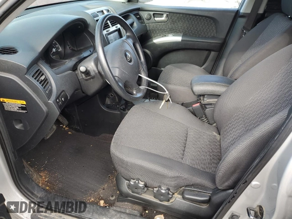 2005 Kia Sportage LX with VIN KNDJF723457132535, listed as a Copart auction lot 52460445 with 180,110 mi miles and Salvage Title. Bid and sale history available at carsss.com. Image 7.
