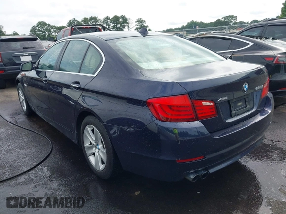 2013 BMW 5 Series 528i xDrive with VIN WBAXH5C52DD115352, listed as a IAAI auction lot 42501265 with 122,421 mi miles and . Bid and sale history available at DreamBid. Image 3.