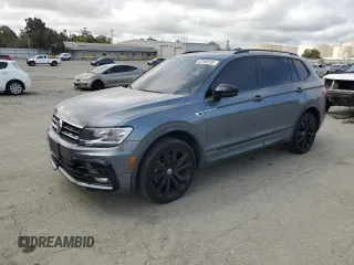 2020 Volkswagen Tiguan SE z VIN 3VV3B7AX1LM155168, wystawiony jako Copart lot #52168195 z przebiegiem 95 062 mil mil oraz Szkody całkowita. Historia ofert i sprzedaży dostępna na DreamBid. Obrazek 1.