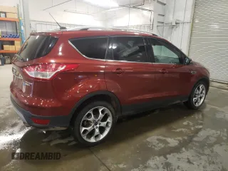 2014 Ford Escape Titanium with VIN 1FMCU9J90EUE36071, listed as a Copart auction lot 51772995 with 81,490 mi miles and Salvage Title. Bid and sale history available at DreamBid. Image 3.