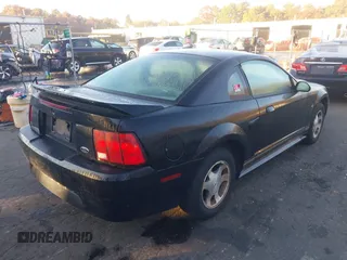 2000 Ford Mustang with VIN 1FAFP4046YF238109, listed as a IAAI auction lot 40656475 with 64,926 mi miles. Bid and sale history available at carsss.com. Image 4.