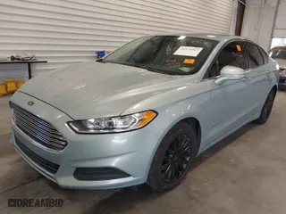 2013 Ford Fusion SE Hybrid with VIN 3FA6P0LUXDR355984, listed as a IAAI auction lot 41977367 with 244,310 mi miles. Bid and sale history available at carsss.com. Image 2.