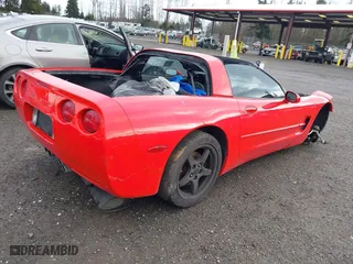 2004 Chevrolet Corvette with VIN 1G1YY22G545121321, listed as a IAAI auction lot 41601136 with 1 mi miles. Bid and sale history available at carsss.com. Image 4.
