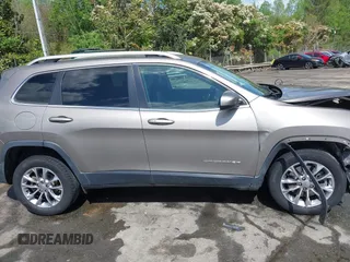 2019 Jeep Cherokee Latitude Plus with VIN 1C4PJLLB5KD184163, listed as a IAAI auction lot 41905051 with 247,574 mi miles. Bid and sale history available at carsss.com. Image 13.