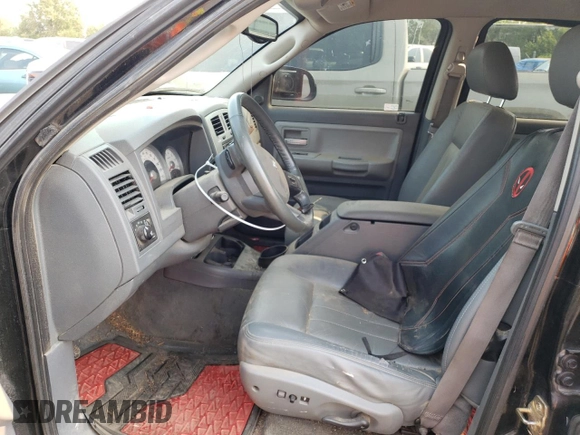 2005 Dodge Dakota Laramie with VIN 1D7HW58N65S161629, listed as a Copart auction lot 66570164 with 205,984 mi miles and Salvage Title. Bid and sale history available at DreamBid. Image 7.