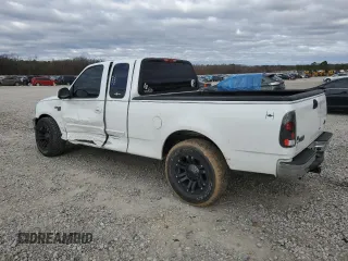 2002 Ford F-150 XL with VIN 1FTRX17W12NA96391, listed as a Copart auction lot 87000064 with 199,867 mi miles and Salvage Title. Bid and sale history available at carsss.com. Image 2.