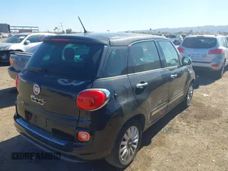 2015 FIAT 500L Lounge with VIN ZFBCFACH1FZ033227, listed as a IAAI auction lot 41636790 with 96,321 mi miles. Bid and sale history available at carsss.com. Image 4.