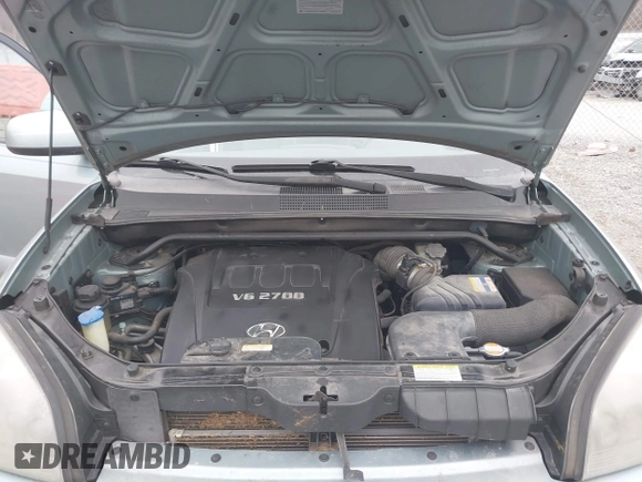 2007 Hyundai Tucson SE with VIN KM8JN12D27U606152, listed as a IAAI auction lot 41465051 with 141,478 mi miles. Bid and sale history available at carsss.com. Image 10.