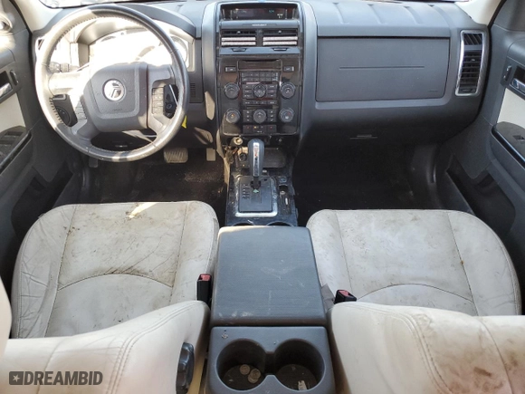 2010 Mercury Mariner Premier with VIN 4M2CN9H75AKJ14600, listed as a Copart auction lot 73352894 with 145,328 mi miles and Salvage Title. Bid and sale history available at carsss.com. Image 8.