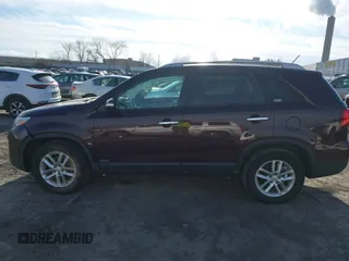 2015 Kia Sorento LX with VIN 5XYKTDA70FG580629, listed as a IAAI auction lot 41623587 with 105,266 mi miles. Bid and sale history available at carsss.com. Image 14.