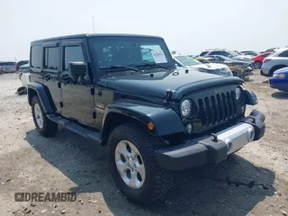 2014 Jeep Wrangler Unlimited Sahara with VIN 1C4BJWEG0EL273086, listed as a IAAI auction lot 42340938 with 121,448 mi miles and . Bid and sale history available at DreamBid. Image 1.