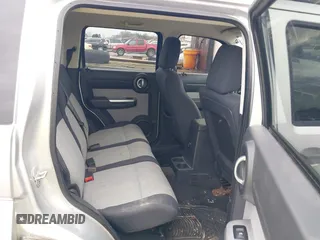 2008 Dodge Nitro SLT with VIN 1D8GT58K58W127412, listed as a IAAI auction lot 41544874 with 232,748 mi miles. Bid and sale history available at carsss.com. Image 8.