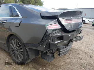 2016 Lincoln MKZ with VIN 3LN6L2G99GR609353, listed as a IAAI auction lot 42106982 with 161,046 mi miles and . Bid and sale history available at DreamBid. Image 13.