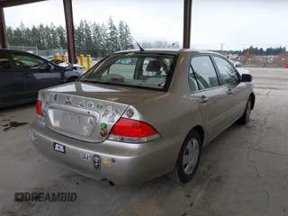 2005 Mitsubishi Lancer ES with VIN JA3AJ26E65U017027, listed as a IAAI auction lot 41765578 with 58,698 mi miles. Bid and sale history available at carsss.com. Image 4.