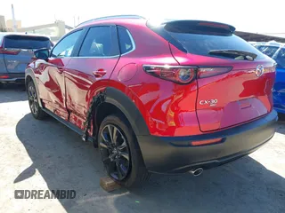 2024 Mazda CX-30 2.5 S Select Sport with VIN 3MVDMBBM0RM707223, listed as a IAAI auction lot 41837227 with 8,043 mi miles. Bid and sale history available at carsss.com. Image 3.