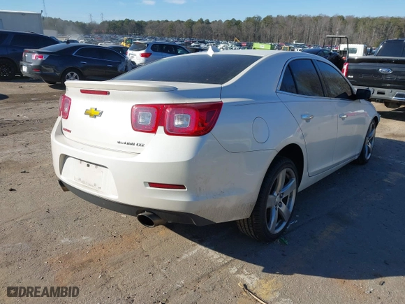 2014 Chevrolet Malibu LTZ with VIN 1G11J5SX7EF204252, listed as a IAAI auction lot 41439734 with 193,123 mi miles. Bid and sale history available at carsss.com. Image 4.