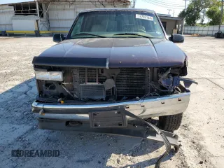 1997 GMC Yukon with VIN 1GKEK13R7VJ711782, listed as a Copart auction lot 74793184 with 208,718 mi miles and Salvage Title. Bid and sale history available at carsss.com. Image 5.