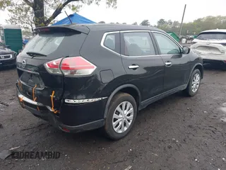 2015 Nissan Rogue SV with VIN KNMAT2MV9FP588090, listed as a IAAI auction lot 42132606 with 107,518 mi miles and . Bid and sale history available at carsss.com. Image 4.