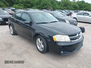 2013 Dodge Avenger SXT with VIN 1C3CDZCB8DN590965, listed as a IAAI auction lot 42154596 with 173,070 mi miles and . Bid and sale history available at carsss.com. Image 1.