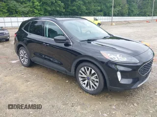 2021 Ford Escape Titanium Hybrid with VIN 1FMCU0DZ0MUA16798, listed as a IAAI auction lot 42502086 with 107,250 mi miles and . Bid and sale history available at DreamBid. Image 1.