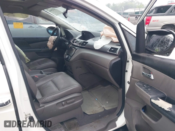 2015 Honda Odyssey EX-L z VIN 5FNRL5H6XFB015751, wystawiony jako IAAI lot #42269688 z przebiegiem 180 804 mil mil oraz . Historia ofert i sprzedaży dostępna na DreamBid. Obrazek 5.