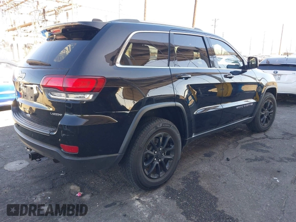 2021 Jeep Grand Cherokee Laredo X with VIN 1C4RJEAG7MC538812, listed as a IAAI auction lot 41337593 with 68,865 mi miles and . Bid and sale history available at DreamBid. Image 4.