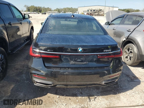 2020 BMW 7 Series 750i xDrive with VIN WBA7U2C0XLGM27270, listed as a Copart auction lot 77241404 with 68,998 mi miles and Salvage Title. Bid and sale history available at carsss.com. Image 6.