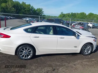 2017 Ford Fusion Titanium with VIN 3FA6P0SU6HR409854, listed as a IAAI auction lot 42143031 with 52,688 mi miles and . Bid and sale history available at DreamBid. Image 13.