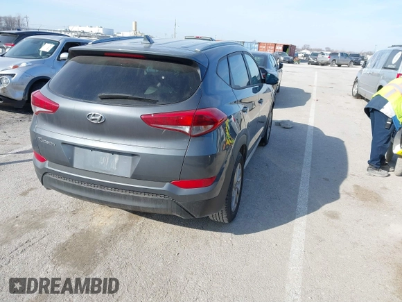 2017 Hyundai Tucson SE Plus with VIN KM8J33A40HU459575, listed as a IAAI auction lot 41703139 with 189,955 mi miles. Bid and sale history available at carsss.com. Image 4.