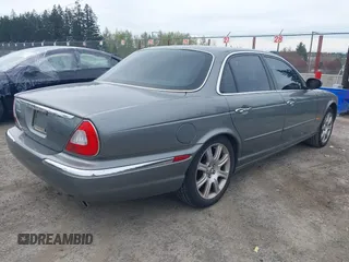2004 Jaguar XJ with VIN SAJEA74C94SG10199, listed as a IAAI auction lot 42007186 with 138,807 mi miles and . Bid and sale history available at DreamBid. Image 4.