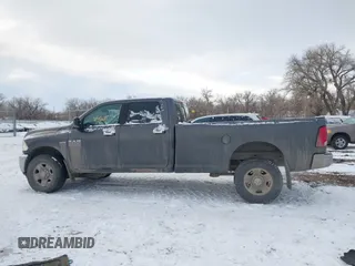 2014 Ram 2500 SLT with VIN 3C6TR5JT5EG203839, listed as a IAAI auction lot 41277795 with 135,344 mi miles and . Bid and sale history available at DreamBid. Image 14.