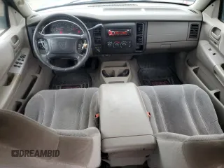 2004 Dodge Dakota SLT z VIN 1D7HG48K04S739865, wystawiony jako Copart lot #57867265 z przebiegiem 214 698 mil mil oraz Tytuł czysty. Historia ofert i sprzedaży dostępna na DreamBid. Obrazek 8.
