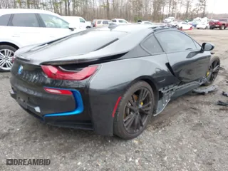 2015 BMW i8 with VIN WBY2Z2C56FVX64947, listed as a IAAI auction lot 41480193 with 51,366 mi miles. Bid and sale history available at carsss.com. Image 4.
