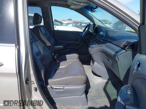 2005 Honda Odyssey EX-L with VIN 5FNRL38705B008884, listed as a IAAI auction lot 42081384 with 219,336 mi miles. Bid and sale history available at carsss.com. Image 5.