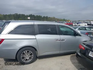 2012 Honda Odyssey EX-L with VIN 5FNRL5H66CB069916, listed as a IAAI auction lot 41935248 with 230,204 mi miles and . Bid and sale history available at carsss.com. Image 13.