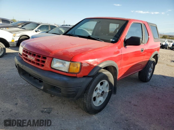 1999 Isuzu Rodeo z VIN 4S2CK57W3X4301044, wystawiony jako Copart lot #75758024 z przebiegiem 209 456 mil mil oraz Czysty tytuł • Clean title. Historia ofert i sprzedaży dostępna na DreamBid. Obrazek 1.