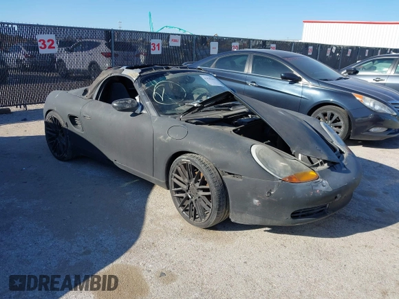 1998 Porsche Boxster с VIN WP0CA2982WU621935, выставлен на аукционе IAAI как лот 41838363 с пробегом Не указан миль и . История ставок и продаж доступна на DreamBid. Изображение 1.