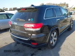 2014 Jeep Grand Cherokee Overland with VIN 1C4RJFCT5EC221015, listed as a IAAI auction lot 41959844 with 78,367 mi miles and . Bid and sale history available at DreamBid. Image 4.