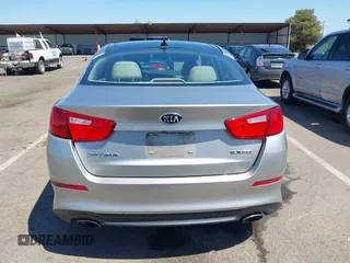 2014 Kia Optima EX with VIN 5XXGN4A75EG317958, listed as a IAAI auction lot 42075557 with 138,903 mi miles and . Bid and sale history available at carsss.com. Image 16.
