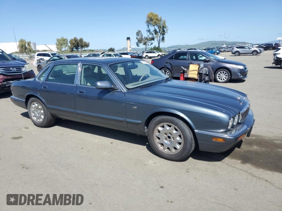 1998 Jaguar XJ with VIN SAJHX1247WC841374, listed as a Copart auction lot 51693595 with 109,509 mi miles and Clean Title. Bid and sale history available at DreamBid. Image 4.